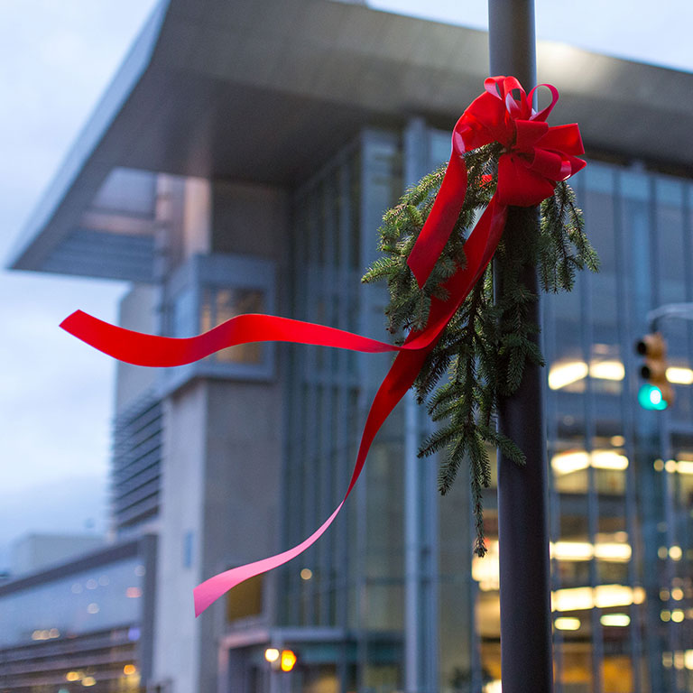 Installing holiday wreaths at IUPUI