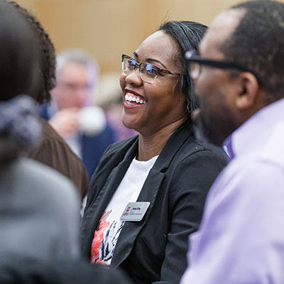 IUPUI employee Jalysa King laughs during the Brunch with the Chancellor event.
